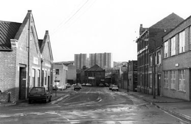 J. Elliot and Sons Sheffield Ltd, Sylvester Works, cutlers (right) and Eldon Engineering Co. Ltd., Sylvester Street looking towards No. 87-91, Edley Brothers, Sidney Street and Silvester Gardens with Claywood Flats in the background