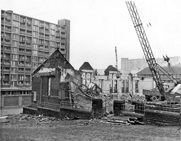 Demolition of Park Junior and Infant School, Duke Street formerly Park County School, with Park Hill Flats in the background