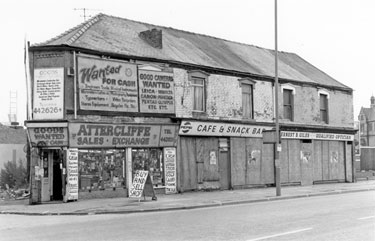 From the junction with Kirkbridge Road; Nos. 870-872, Attercliffe Sales and Exchange; former premises of E.B.O.Said, Cafe Nos. 866-868; Ernest B. Giles, optician, Nos. 862-864 Attercliffe Road looking towards the junction with Beverley Street