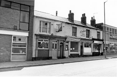 Nos. 732, Station Hotel (licensee Michael O'Sullivan) 730 former cafe; H. Hewitt, ladies and gents hairdressers; 726 butchers and D.B Furnishers Ltd., Attercliffe Road 