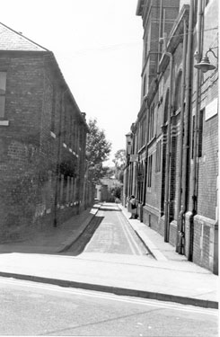 Convent Walk from Cavendish Street looking towards Victoria Street with Glossop Road Baths right and Notre Dame School left