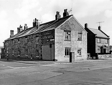 Nos. 1-4 (No. 9 is the blank wall at the end left), Hatfield Cottages, Hatfield House Lane and the junction of Sicey Avenue with Trustee Savings Bank right Spring 1967