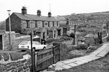 Nos. 1-11, former almshouses and 13, Ivanhoe Road originally called Ivy Road off Stannington Road showing Bole Hill School on the skyline