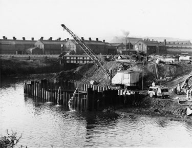 Construction of Tinsley Viaduct, M1 Motorway over the River Don with Hadfields East Hecla Works in the background