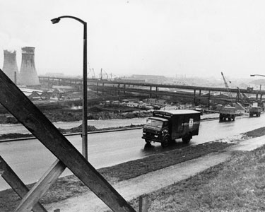 Construction of Tinsley Viaduct, M1 Motorway from Meadwbank Road with the Cooling Towers from Blackburn Meadows Power Station left