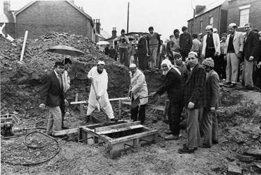 Laying the foundation stone of Central Mosque, Industry Road, Darnall with chairman of the Mosque trustees Khan Asfar in white with the spade 