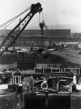 One of the final cargos to be carried on the canal, Alan Olivers' Barge, Thomas Porter unloading at Tinsley Wire Ltd., Sheffield and SYK Navigation 