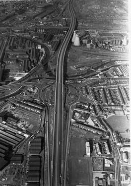 Aerial view of M1 motorway, Tinsley Viaduct showing Tinsley roundabout; Bawtry Road (right); River Don; Sheff and SYK Navigation; Blackburn Meadows Power Station and Hadfields Co. Ltd., East Hecla Works left