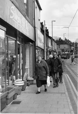 Shoppers on Middlewood Road looking towards Dykes Hall Road