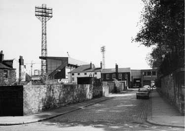 Unstone Street from Denby Street looking towards John Street with Sheffield United Football Club, Bramall Lane Ground in the background 