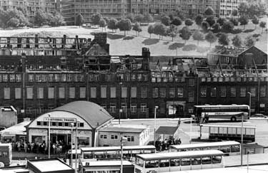 Demolition of Joseph Rogers and Sons Ltd., River Lane Works, junction of Sheaf Street and Pond Hill, recently occupied by Sheffield City Council Housing Department offices with National Travel and Pond Street bus station in the foreground