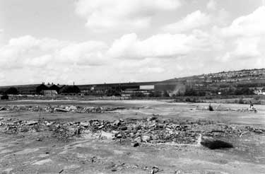 Sheffield Forgemasters, River Don Works from demolished Carbrook Street with housing on Wincobank Hill in the background