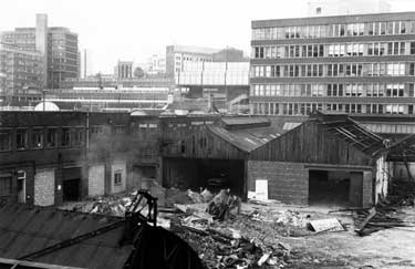 Former George Senior and Sons Ltd., Ponds Forge, Sheaf Street during demolition with (left to right) Sheffield Polytechnic; Leader House; Central Library and General Post Office in the background