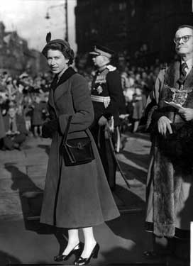 Queen Elizabeth II going to inspect the Guard of Honour outside the Town Hall  with Lord Mayor, J.H. Bingham right and Roger Lumley 11th Earl of Scarborough, Lord Lieutenant of West Riding of Yorkshire left 