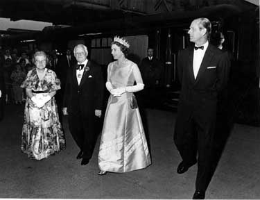 Queen Elizabeth and HRH Duke of Edinburgh accompanied by the Lord Mayor and Lady Mayoress, Albert Richardson and Mrs. Richardson leave the Royal Train at Midland Station for the evening reception at the Cutlers Hall