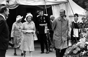 Queen Elizabeth and HRH Duke of Edinburgh in Hillsborough Park in the background is the Lord Lieutenant of South Yorkshire, Gerard Young (centre) and Lord Mayor, Councillor Mrs Winifred Mary Golding (left)