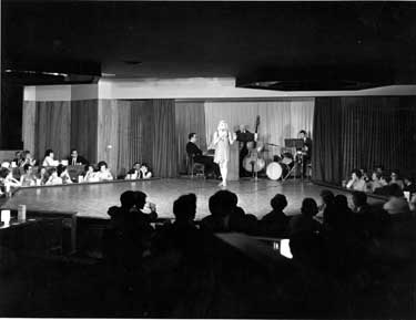 Diana Dors (1931-1984) on stage at the Cavendish Club, Bank Street