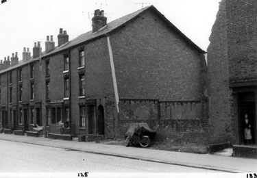 Hodgson Street, showing the gap between No. 125 and No. 133 (with the lady standing outside). This was caused by bomb damage during World War 2.