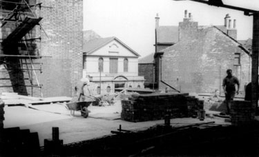Building works at Walker and Hall Ltd., Electro Works, Eyre Street, looking towards Surrey Street and United Methodist Church, Leader House, right