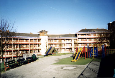 Playground enclosed by Edward Street Flats