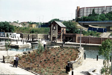 Restored Canal Basin renamed Victoria Quays looking towards Basin Masters Office with Hyde Park Flats in the background
