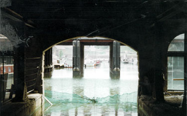View of the Canal Basin from under the Terminal Building and Straddle Warehouse