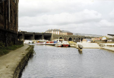 Boat yard near Cadman Street Bridge Sheffield and South Yorkshire Navigation looking towards Victoria Station Viaduct and Royal Victoria Hotel