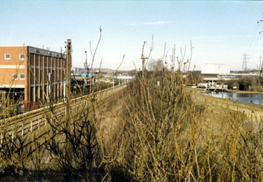 Supertram tracks (extreme left), Railway and Tinsley Locks near Supertram Stop at Carbrook