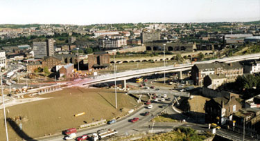 Supertram Viaduct under construction at Park Square with the Canal Basin during refurbishment