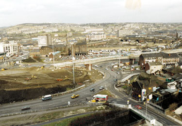 Elevated view of Supertram construction at Park Square with Duke Street and Midland Railway Bridge in the foreground and Canal Basin before restoration (centre)