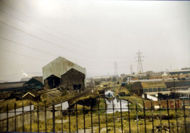 View from near the Aqueduct of Brown Bayley Steels Ltd. (left) and barge on South Yorkshire Navigation