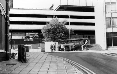 Pond Hill looking towards the steps to Pond Street with NCP multistorey car park, Tai Sun, Chinese Supermarket and The Friery, Fish and Chip Shop in the background