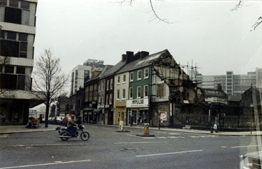Cambridge Street at the junction with Barkers Pool and Division Street with Cole Brothers, department store left and site of demolished Albert public house and No. 8 Impulse