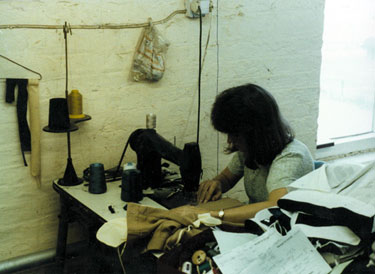 Sewing machinist at work S. D. Williams, tailors, Butcher Works, No. 72, Arundel Street