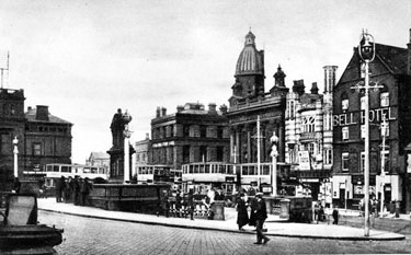 Fitzalan Square looking towards Haymarket, showing (right to left) Bell Hotel, Classic Cinema, Barclays Bank and Yorkshire Bank with King Edward VII Statue (centre)