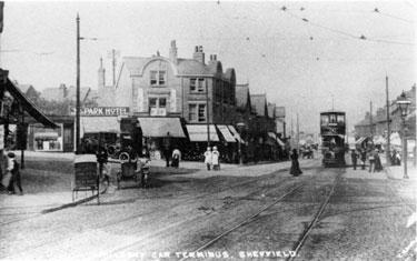 Middlewood Road and the junction with Wadsley Lane showing The Park Hotel sign; Nos. 4 Thomas Hetherington, butcher;2 Ernest Hawley, newsagent, and Nos. 277, Greenlees and Sons, boot dealers and 279 and A. Harwood Lingard, ironmonger, Middlewood Road