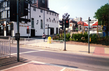 Pelican crossing on Pond Street looking towards Surrey Lane with (left) The Howard Hotel, No. 57 Howard Street
