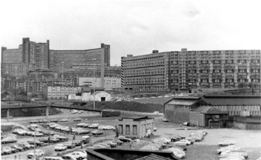Elevated view of the site of the old Sheaf Market (Rag Market) being used as a car park with Hyde Park Flats and Park Flats (left) in the background