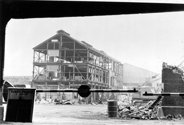 Demolition of Hadfields Co. Ltd., East Hecla Works looking through the main gate the main building was the stores, the forge in distance left; Bar Mill, rear right, the brick corner right was the canteen 