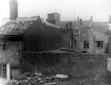 Derelict properties on Bard Street, Park. Premises in background front Broad Street. Tower of the Goods Depot in background