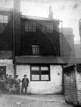 Rear of Nos. 12 (left) and 14 Waingate. No. 12 Rose and Crown public house, No. 14 James Walker and Co. Ltd. Castle Hill, right. Building in background is the Court House