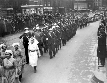 A.R.P, First Aid, Ambulance and Rescue Service March passing the Town Hall, WWII