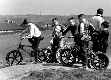 BMX Riders in Parson Cross Park with Keppels Column on the skyline