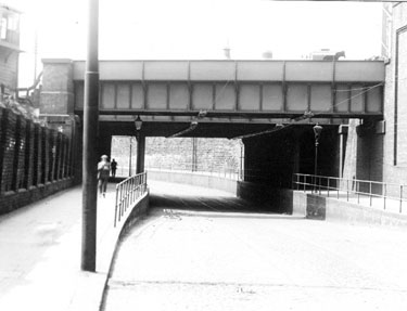 Upwell Street Railway Bridges and Signal Box (extreme left) with a Steam Locomotive making its journey across right to left