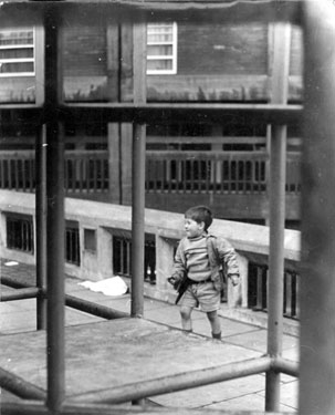 Boy playing at Park Hill Flats