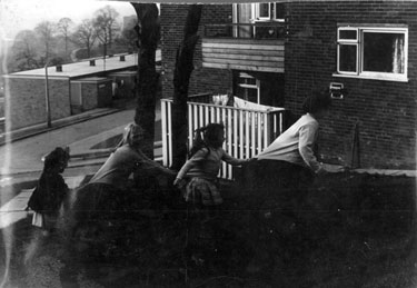 Children playing outside flats in Gleadless Valley area