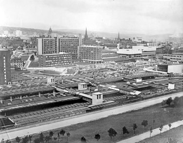 Elevated view of Sheffield Midland railway station and Pond Street bus station looking towards Hallam University with Sheaf Square roundabout and Howard Street leading to Arundel Gate left and Club Fiesta, nightclub and Top Rank Suite right