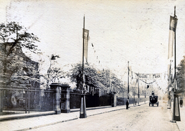 Decorations for the royal visit of the Duke and Duchess of York (later King George V) outside Shrewsbury Hospital, Norfolk Road, 