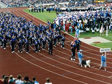 Great Britain Team (throwing chocolates to the crowd) lead out by Sheff the World Student Games Mascot, Opening Ceremony, World Student Games, Don Valley Stadium