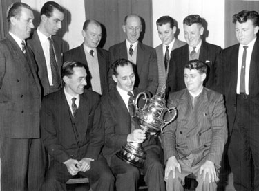 English Steel Corporation cricket team cup winners presentation at the Sports Club Dinner, Captain Bob Short with the Cup